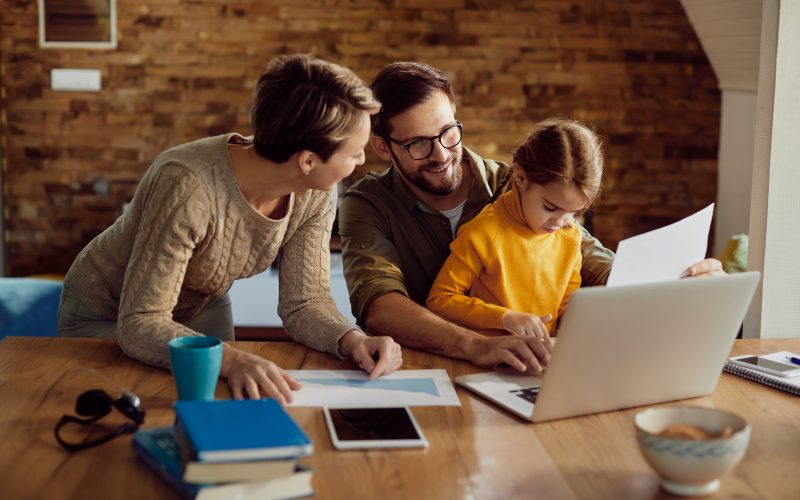 Australian family reviewing home finances together